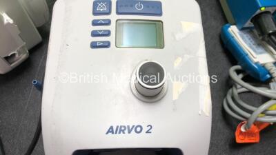 Mixed Lot Including 1 x GE Transport Pro Patient Monitor with 1 x AC Power Supply (Powers Up with Damaged Power Port-See Photo) 1 x Fisher & Paykel Ref PT101UK Airvo 2 Humidifier Unit (Powers Up with Blank Display and Alarm) 1 x enLow Controller Model 121 - 5