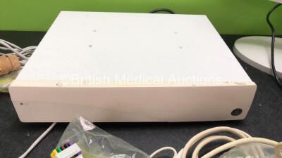 Mixed Lot Including 1 x GE CDA19 Monitor with 1 x AC Power Supply (Powers Up with Missing Dial-See Photo), 1 x GE Pro Clinical Information Centre (Powers Up) Various Patient Monitoring Cables *SN - 4