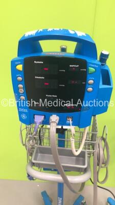 2 x GE Dinamap ProCare Auscultatory Vital Signs Monitors on Stands with 2 x BP Hoses and 1 x SPO2 Finger Sensor (Both Power Up) - 4