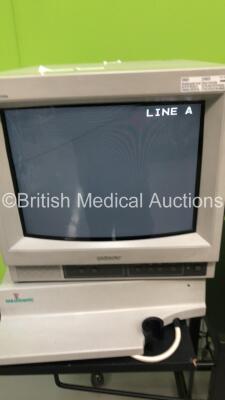 2 x Sony Trinitron Monitors on Stand (1 x Powers Up - 1 x Damaged Casing - See Pictures) - 3