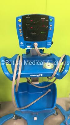 4 x GE Carescape V100 Patient Monitors on Stands with 2 x Sp02 Finger Sensors and 4 x BP Hoses (All Power Up) - 4
