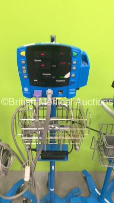 4 x GE Carescape V100 Patient Monitors on Stands with 3 x Sp02 Finger Sensors and 3 x BP Hoses (3 x Power Up,1 x No Power) - 3