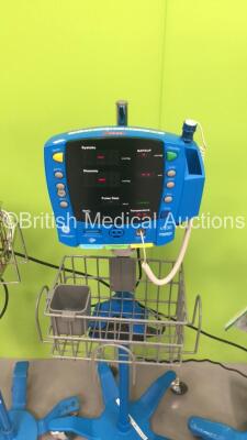 4 x GE Carescape V100 Patient Monitors on Stands with 3 x Sp02 Finger Sensors and 3 x BP Hoses (3 x Power Up,1 x No Power) - 4