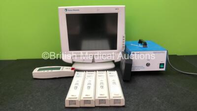 Mixed Lot Including 1 x Masimo Radical 7 Handheld Pulse Oximeter (Untested Due to Missing Docking Station) 4 x Datex Ohmeda Ref 896895 Batteries, 1 x Datex Ohmeda Blank Module, 1 x Seward Medical 19.5113 Light Source (Powers Up)