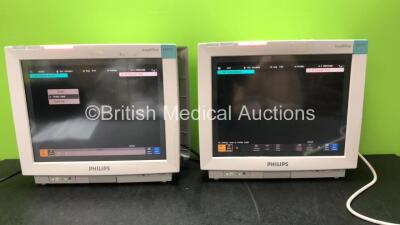 2 x Philips IntelliVue M8007A MP70 Touch Screen Patient Monitors Software Revision L.01.22, L.01.22 (Both Power Up) *Mfd 07-2008, 07-2008*