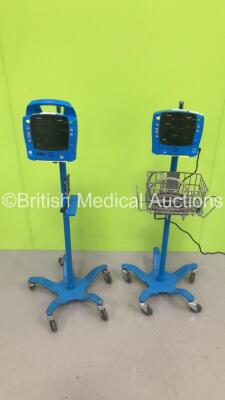 1 x GE V100 Patient Monitor on Stand with 1 x BP Hose and 1 x GE Dinamap Carescape Patient Monitor on Stand (1 x Powers Up,1 x No Power-1 x Crack to Casing-See Photos)