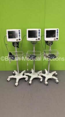 3 x Criticare Systems Inc nGenuity Patient Monitors on Stands with ECG/Resp,Temp,SpO2 and NIBP Options,3 x BP Hoses and 3 x BP Cuffs (All Power Up) * SN 209246760/ 209246736 / 209246711 *