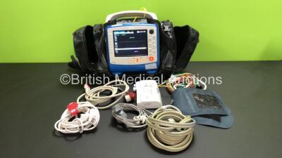 Zoll X Series 12 Lead Monitor / Defibrillator with ECG, SPO2, NIBP, CO2 and Printer Options, 2 x Batteries (1 x Housed within Unit), 1 x NIBP Cuff and Hose, 1 x SPO2 Finger Sensor, 1 x Paddle Lead, 12 Lead ECG Lead, WiFi Dongle and Base Bracket in a Zoll 