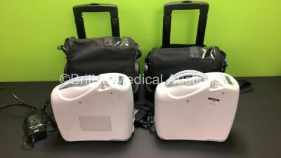 2 x Portable Inogen One G2 Oxygen Concentrators Model 10-200 with Power Supplies, Bags and Wheels (Both Power Up)