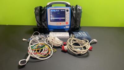 Zoll X Series 12 Lead Monitor / Defibrillator with ECG, SPO2, NIBP, CO2 and Printer Options, 2 x Batteries (1 x Housed within Unit), 1 x NIBP Cuff and Hose, 1 x SPO2 Finger Sensor, 1 x Paddle Lead, 12 Lead ECG Lead, WiFi Dongle and Base Bracket in a Zoll 