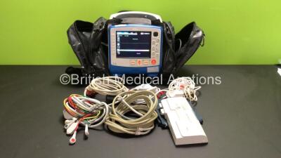 Zoll X Series 12 Lead Monitor / Defibrillator with ECG, SPO2, NIBP, CO2 and Printer Options, 2 x Batteries (1 x Housed within Unit), 1 x NIBP Cuff and Hose, 1 x SPO2 Finger Sensor, 1 x Paddle Lead, 12 Lead ECG Lead, WiFi Dongle and Base Bracket in a Zoll