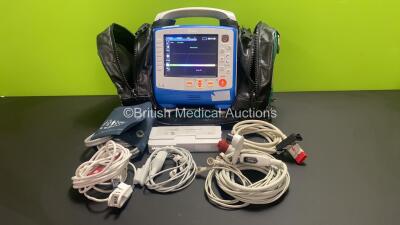 Zoll X Series 12 Lead Monitor / Defibrillator with ECG, SPO2, NIBP, CO2 and Printer Options, 2 x Batteries (1 x Housed within Unit), 1 x NIBP Cuff and Hose, 1 x SPO2 Finger Sensor, 1 x Paddle Lead, 12 Lead ECG Lead, WiFi Dongle and Base Bracket in a Zoll