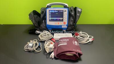 Zoll X Series 12 Lead Monitor / Defibrillator with ECG, SPO2, NIBP, CO2 and Printer Options, 2 x Batteries (1 x Housed within Unit), 1 x NIBP Cuff and Hose, 1 x SPO2 Finger Sensor, 1 x Paddle Lead, 12 Lead ECG Lead, WiFi Dongle and Base Bracket in a Zoll 