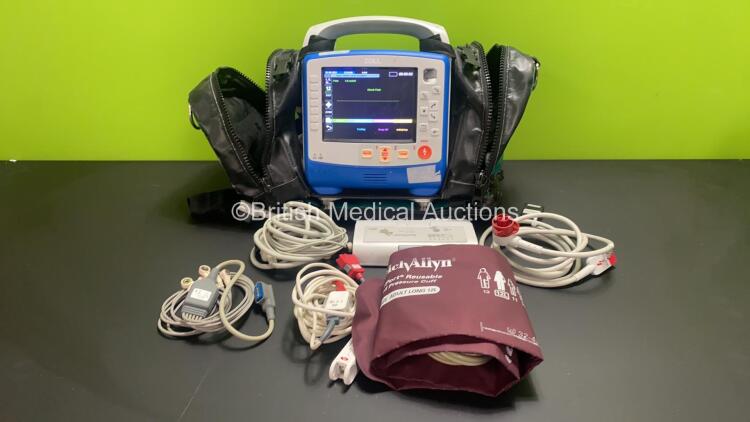 Zoll X Series 12 Lead Monitor / Defibrillator with ECG, SPO2, NIBP, CO2 and Printer Options, 2 x Batteries (1 x Housed within Unit), 1 x NIBP Cuff and Hose, 1 x SPO2 Finger Sensor, 1 x Paddle Lead, 12 Lead ECG Lead, WiFi Dongle and Base Bracket in a Zoll