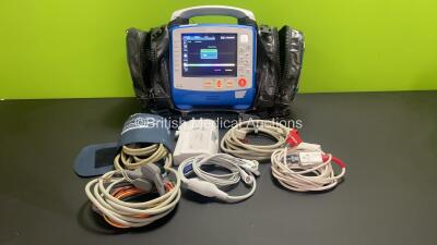 Zoll X Series 12 Lead Monitor / Defibrillator with ECG, SPO2, NIBP, CO2 and Printer Options, 2 x Batteries (1 x Housed within Unit), 1 x NIBP Cuff and Hose, 1 x SPO2 Finger Sensor, 1 x Paddle Lead, 12 Lead ECG Lead, WiFi Dongle and Base Bracket in a Zoll 