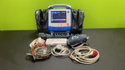 Zoll X Series 12 Lead Monitor / Defibrillator with ECG, SPO2, NIBP, CO2 and Printer Options, 2 x Batteries (1 x Housed within Unit), 1 x NIBP Cuff and Hose, 1 x SPO2 Finger Sensor, 1 x Paddle Lead, 12 Lead ECG Lead, WiFi Dongle and Base Bracket in a Zoll