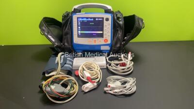 Zoll X Series 12 Lead Monitor / Defibrillator with ECG, SPO2, NIBP, CO2 and Printer Options, 2 x Batteries (1 x Housed within Unit), 1 x NIBP Cuff and Hose, 1 x SPO2 Finger Sensor, 1 x Paddle Lead, 12 Lead ECG Lead, WiFi Dongle and Base Bracket in a Zoll