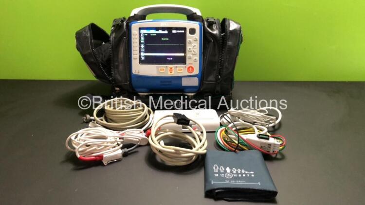 Zoll X Series 12 Lead Monitor / Defibrillator with ECG, SPO2, NIBP, CO2 and Printer Options, 2 x Batteries (1 x Housed within Unit), 1 x NIBP Cuff and Hose, 1 x SPO2 Finger Sensor, 1 x Paddle Lead, 12 Lead ECG Lead, WiFi Dongle and Base Bracket in a Zoll