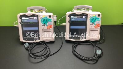 2 x Philips Heartstart MRx Defibrillators Including ECG and Printer Options with 2 x Philips M3539A Batteries, 2 x Philips M3538 Module, 2 x ECG Leads and 2 x Paddle Leads (Both Power Up) *US00546534 - US00546546*