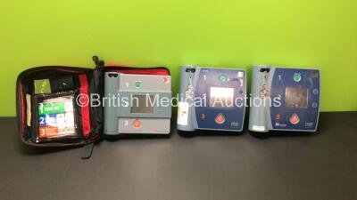 Job Lot Including 1 x Laerdal Heartstart FR2+ Defibrillator (Powers Up and Passes Self Test with Stock Battery - Not Included) 1 x Philips HeartStart FR2+ Defibrillator (Powers Up with Fault) and 1 x ForeRunner Heartstream Semi-Automatic Defibrillator wit