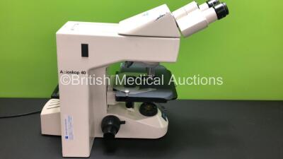 Zeiss Axioskop 40 Benchtop Microscope with 3 x Optics (1 x ACHROPLAN 40x/0,65 - ACHROPLAN 10x/0,25 - ACHROPLAN 100a/1,25 Oil) and E-PI 10x/23 Eyepieces (Powers Up) *3308002303* - 2