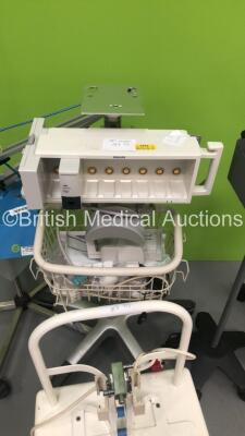 Mixed Lot Including 1 x Aerosol Medical Suction Unit,1 x Accoson BP Meter on Stand,1 x Philips Module Rack with 1 x Philips IntelliBridge EC10 Module,1 x Daray Medical Patient Examination Light and 1 x Schulte Vernebler U-3002-E on Stand (Powers Up) - 3