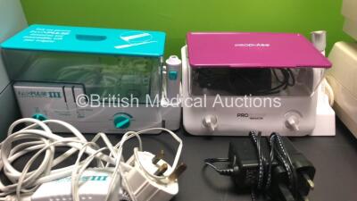 Mixed Lot Including 1 x Respironics CoughAssist, 2 x Propulse Irrigators with Power Supplies and 4 x Porta-Neb Nebulizers - 2