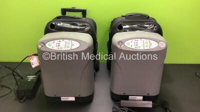 2 x Devilbiss iGO Portable Oxygen System Ref.306DS with Cases on Wheels,1 x AC and 1 x DC Power Supply (Both Power Up)