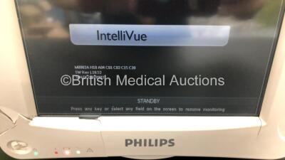 1 x Philips IntelliVue MP30 Patient Monitor (Powers Up with Damage to Casing and Power Button - See Photos )and 1 x Philips IntelliVue MP70 Patient Monitor (Powers Up with Missing Dial and Damaged Module Port - See Photo) - 2