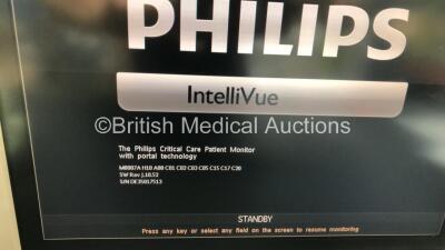 1 x Philips IntelliVue MP30 Patient Monitor (Powers Up with Damage to Casing and Power Button - See Photos )and 1 x Philips IntelliVue MP70 Patient Monitor (Powers Up with Missing Dial and Damaged Module Port - See Photo) - 6