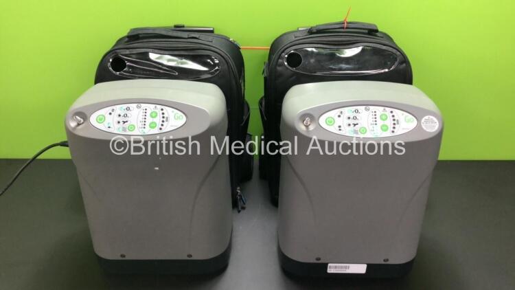 2 x Devilbiss iGO Portable Oxygen System Ref.306DS with Cases on Wheels (Both Power Up with Stock Power Supply - Not Included)