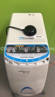 ConMed System 5000 Electrosurgical / Diathermy Unit on Stand with Dome Footswitch (Powers Up) *S/N 04CGP024* - 2