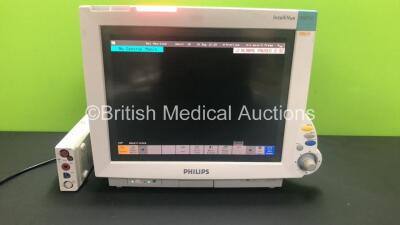 Philips IntelliVue MP70 Patient Monitor M8007A *Mfd 2006* (Mark on Screen Surround - See Pictures) with Philips MM3001A Module with Press, Temp, NBP, SPO2 and ECG/Resp Options *Mfd 2014* (Powers Up) *S/N DE907Z5124 / DE61744533*