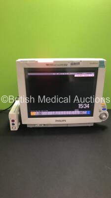 Philips IntelliVue MP70 Neonatal M8007A Patient Monitor *Mfd 2012* with Philips M3001A Module with Press, Temp, NBP, SPO2 and Resp/ECG Options *Mfd 2007* (Powers Up - Damage to Corner of Screen - See Pictures) *S/N DE717M4921 / DE843B6458*