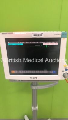 Philips IntelliVue MP70 Patient Monitor Ref M8007A on Stand with 1 x M3001A Module with Press,Temp,NBP,SpO2,ECG/Resp Options and 1 x Press M1006B Module (Powers Up) * SN DE61744490 * * Mfd 2006 * - 2