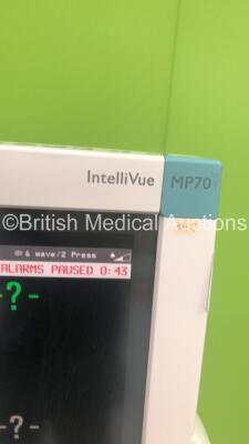 Philips IntelliVue MP70 Patient Monitor Ref M8007A on Stand with 1 x M3001A Module with Press,Temp,NBP,SpO2,ECG/Resp Options and 1 x Press M1006B Module (Powers Up) * SN DE61744490 * * Mfd 2006 * - 3