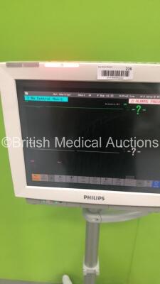 Philips IntelliVue MP70 Patient Monitor Ref M8007A on Stand with 1 x M3001A Module with Press,Temp,NBP,SpO2,ECG/Resp Options and 1 x Press M1006B Module (Powers Up) * SN DE61744490 * * Mfd 2006 * - 4