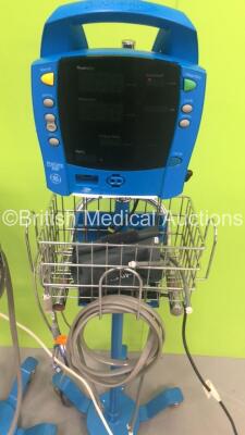 2 x GE ProCare Auscultatory 300 Patient Monitors on Stands with 2 x SpO2 Finger Sensors,2 x BP Hoses and 1 x BP Cuff (Both Power Up with Errors-See Photos) * SN 2019194-001 / 2019194-001 * - 3