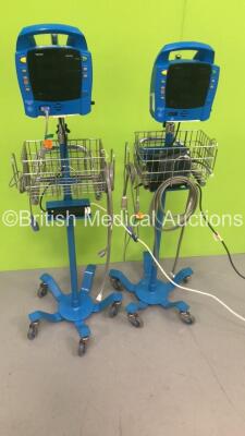 2 x GE ProCare Auscultatory 300 Patient Monitors on Stands with 2 x SpO2 Finger Sensors,2 x BP Hoses and 1 x BP Cuff (Both Power Up with Errors-See Photos) * SN 2019194-001 / 2019194-001 * - 4