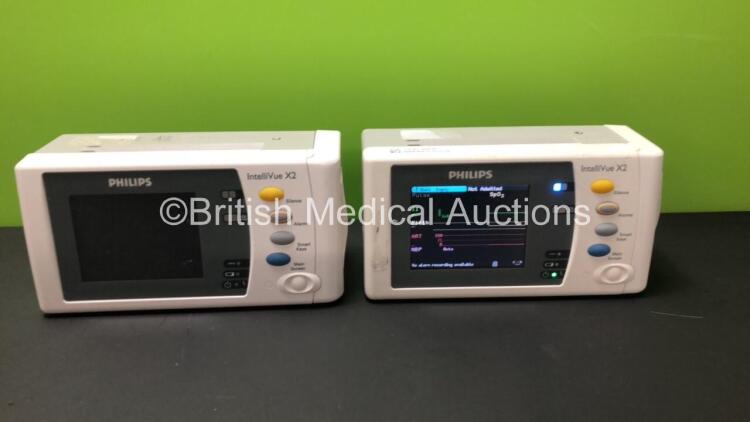 2 x Philips IntelliVue X2 Handheld Patient Monitors Including ECG, SpO2, NBP, Temp, and Press Options Software Revision J.10.53 - H.15.45 *Mfd 2011 - 2009* (Both Power Up)