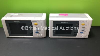 2 x Philips IntelliVue X2 Handheld Patient Monitors Including ECG, SpO2, NBP, Temp, and Press Options Software Revision H.15.45 - H.15.36 *Mfd 2012 - 2008* (Both Power Up)