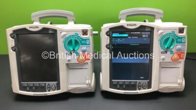 2 x Philips Heartstart MRx Defibrillators Including ECG and Printer Option with 2 x Philips M3539A Batteries and 1 x Philips M3538 Module (Both Power Up)