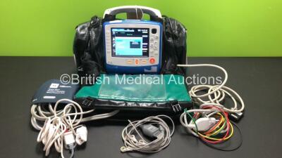 Zoll X Series 12 Lead Monitor / Defibrillator with ECG, SPO2, NIBP, CO2 and Printer Options, 2 x Batteries (1 x Housed within Unit), 1 x NIBP Cuff and Hose, 1 x SPO2 Finger Sensor, 1 x Paddle Lead, 12 Lead ECG Lead, WiFi Dongle and Base Bracket in a Zoll