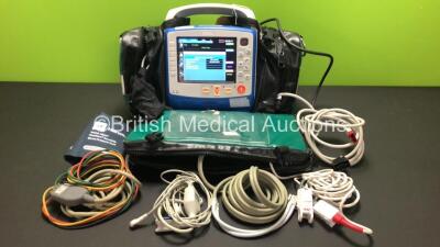 Zoll X Series 12 Lead Monitor / Defibrillator with ECG, SPO2, NIBP, CO2 and Printer Options, 2 x Batteries (1 x Housed within Unit), 1 x NIBP Cuff and Hose, 1 x SPO2 Finger Sensor, 1 x Paddle Lead, 12 Lead ECG Lead, WiFi Dongle and Base Bracket in a Zoll 