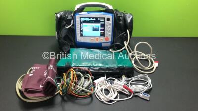 Zoll X Series 12 Lead Monitor / Defibrillator with ECG, SPO2, NIBP, CO2 and Printer Options, 2 x Batteries (1 x Housed within Unit), 1 x NIBP Cuff and Hose, 1 x SPO2 Finger Sensor, 1 x Paddle Lead, 12 Lead ECG Lead, WiFi Dongle and Base Bracket in a Zoll 