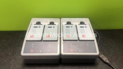 2 x Physio Control Ref 11141-000107 Station Li-ion Battery Chargers with 4 x Physio Control Ref 21330-001176 Li-ion Rechargeable Batteries (Both Power Up) *SN LP15S04025, LP15S04012*