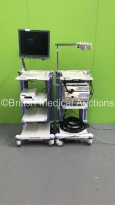 2 x Olympus Stack Trolleys Including Olympus OEV191H Monitor,Olympus Evis Lucera CV-260 Processor,Olympus Evis Lucera CLV-260 Processor/Light Source Unit,Olympus MAJ-1154 Pigtail Connector,Sony Color Video Printer UP-25MD,Olympus Keyboard and Connector Ca