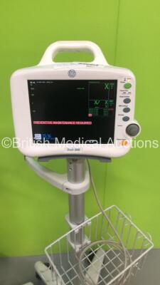 1 x GE Dash 3000 Patient Monitor on Stand with SpO2,Temp/CO,NBP and ECG Options and 1 x GE Dash 3000 Patient Monitor on Stand with SpO2,Temp/CO,CO2,NBP and ECG Options (Both Power Up) - 3