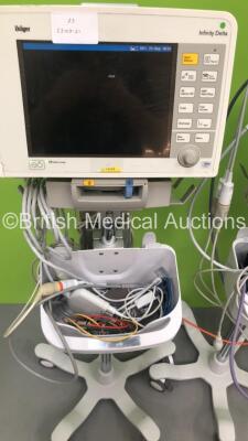 4 x Drager Infinity Delta Patient Monitors on Stands with MemoMed 1, MultiMed, Aux/Hemo2, Aux/Hemo3 and Selection of Leads / Cables (All Power Up - 1 x Error Message Displayed - See Pictures) *S/N 5399410662 / 5399447150 / 5399485447 / 539977349* - 2