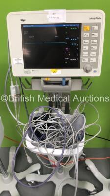 4 x Drager Infinity Delta Patient Monitors on Stands with MemoMed 1, MultiMed, Aux/Hemo2, Aux/Hemo3 and Selection of Leads / Cables (All Power Up - 1 x Error Message Displayed - See Pictures) *S/N 5399410662 / 5399447150 / 5399485447 / 539977349* - 4